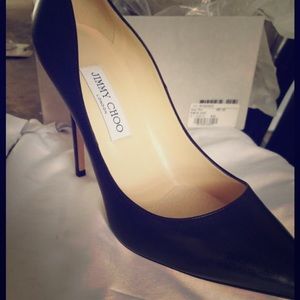 Three pairs of Jimmy Choo pumps.